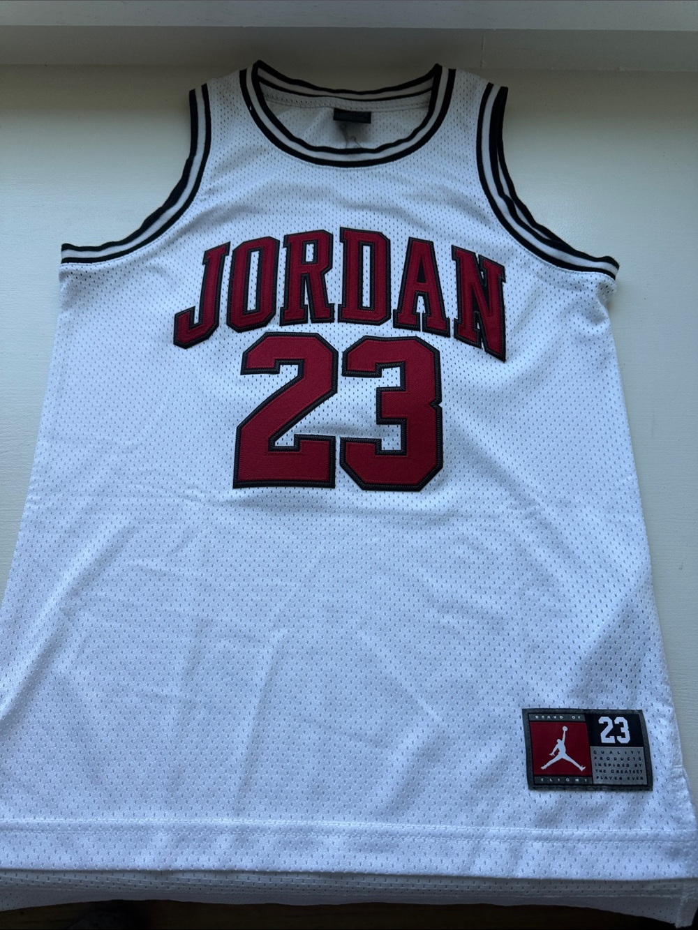 Jordan White Mesh Basketball Jersey with Red Accents